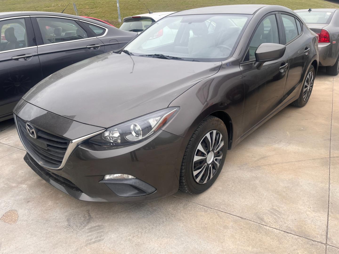 2015 BEIGE MAZDA MAZDA3 I SPORT W/SKY i Sport AT 4-Door (3MZBM1U73FM) with an 2.0L L4 DOHC 16V engine, 6-Speed Automatic transmission, located at 8101 E. Skelly Dr., Tulsa, OK, 74129, (918) 592-3593, 36.121891, -95.888802 - Photo#0